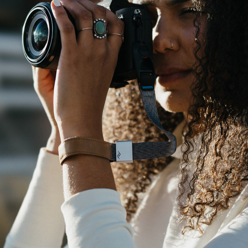 (image), Anne holding her camera with the ash cuff on her wrist, CF-AS-3, ash