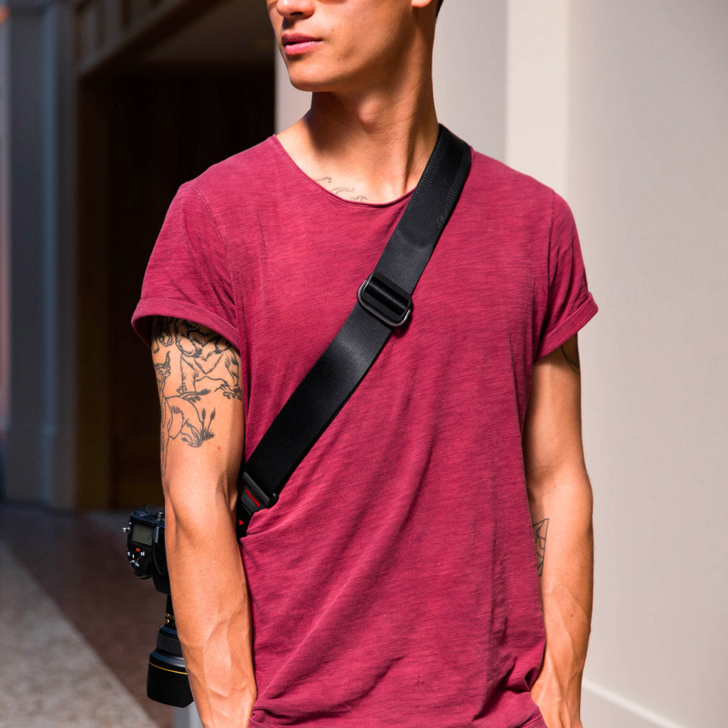 (image), Alvin wearing the black slide as sling carry, SL-BK-3, black