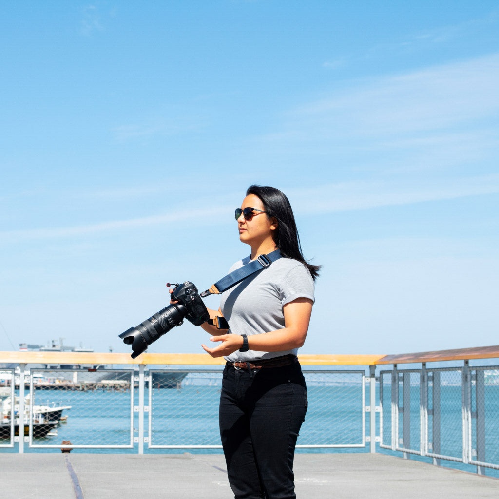 (image), Suzy wearing the slide as sling carry with her camera, SL-MN-3, midnight