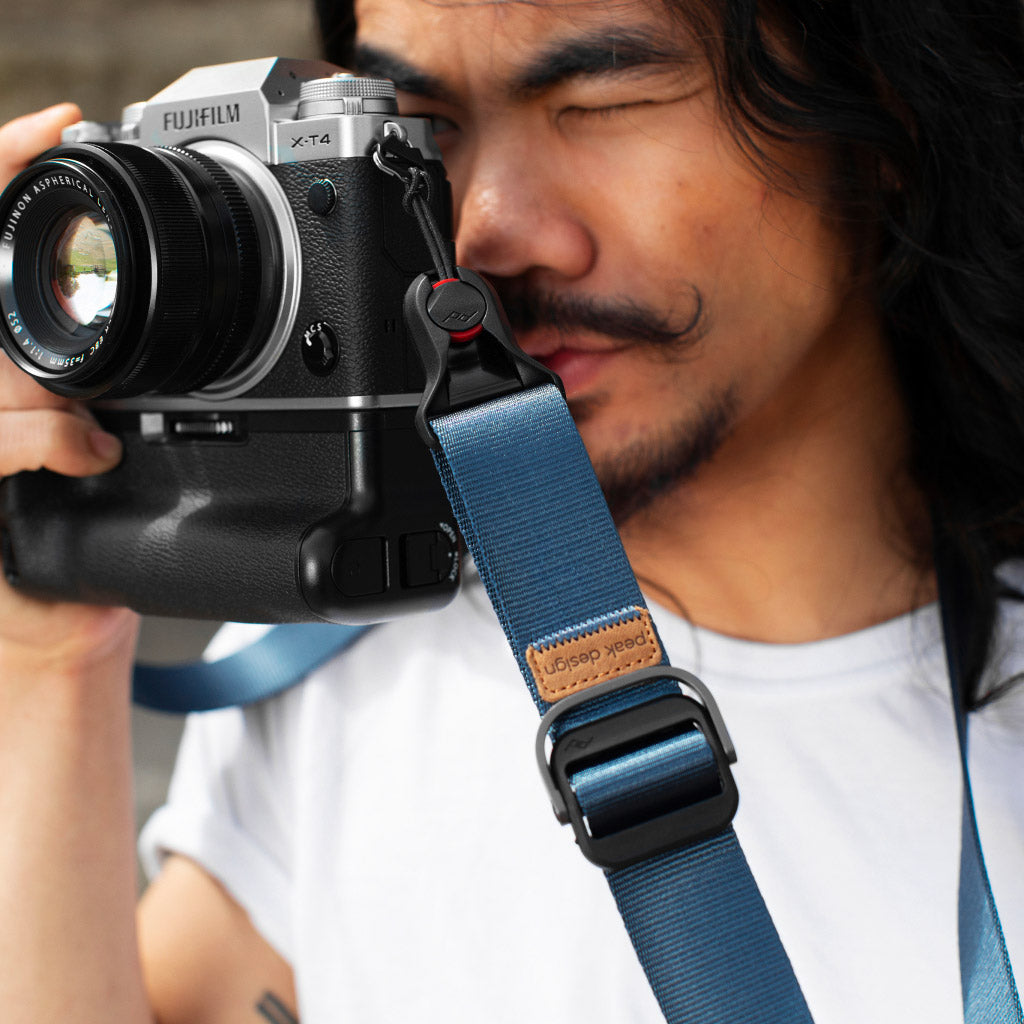 (image), Alvin using his camera connected to midnight slide lite strap, SLL-MN-3, midnight