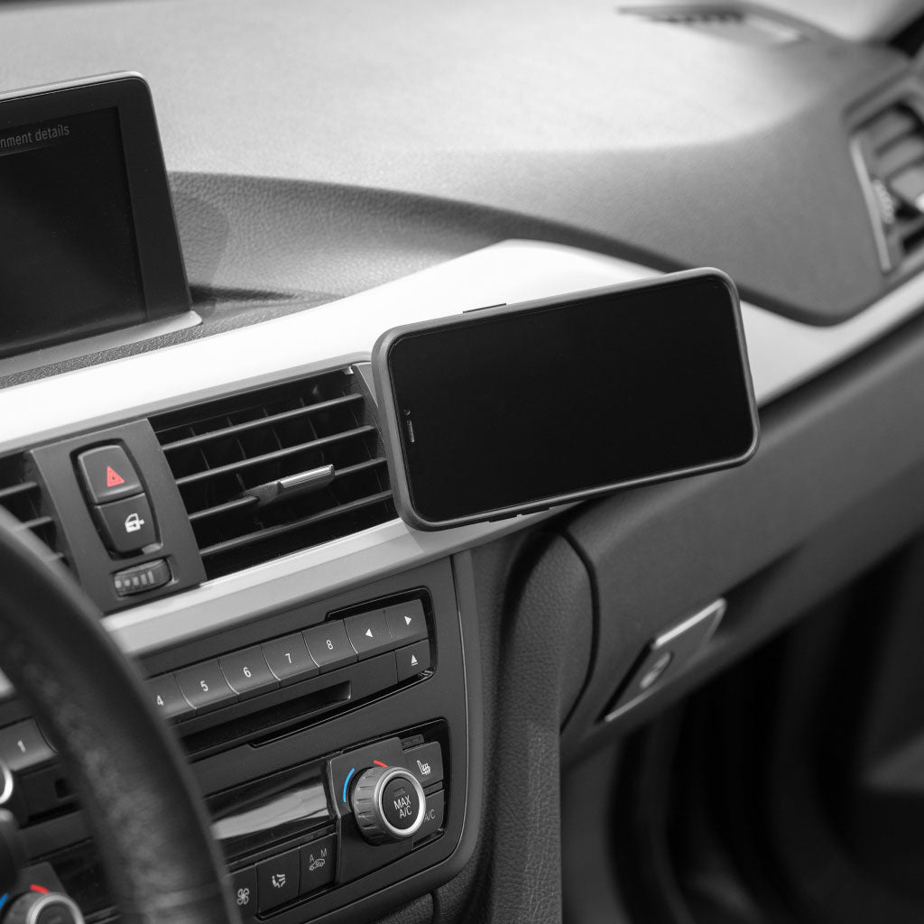 (image), A phone horizontally attached to a car mount placed beside the car's air ventilation, M-CM-AB-BK-1, M-CM-AA-BK-1, M-CM-AA-BK-2, black