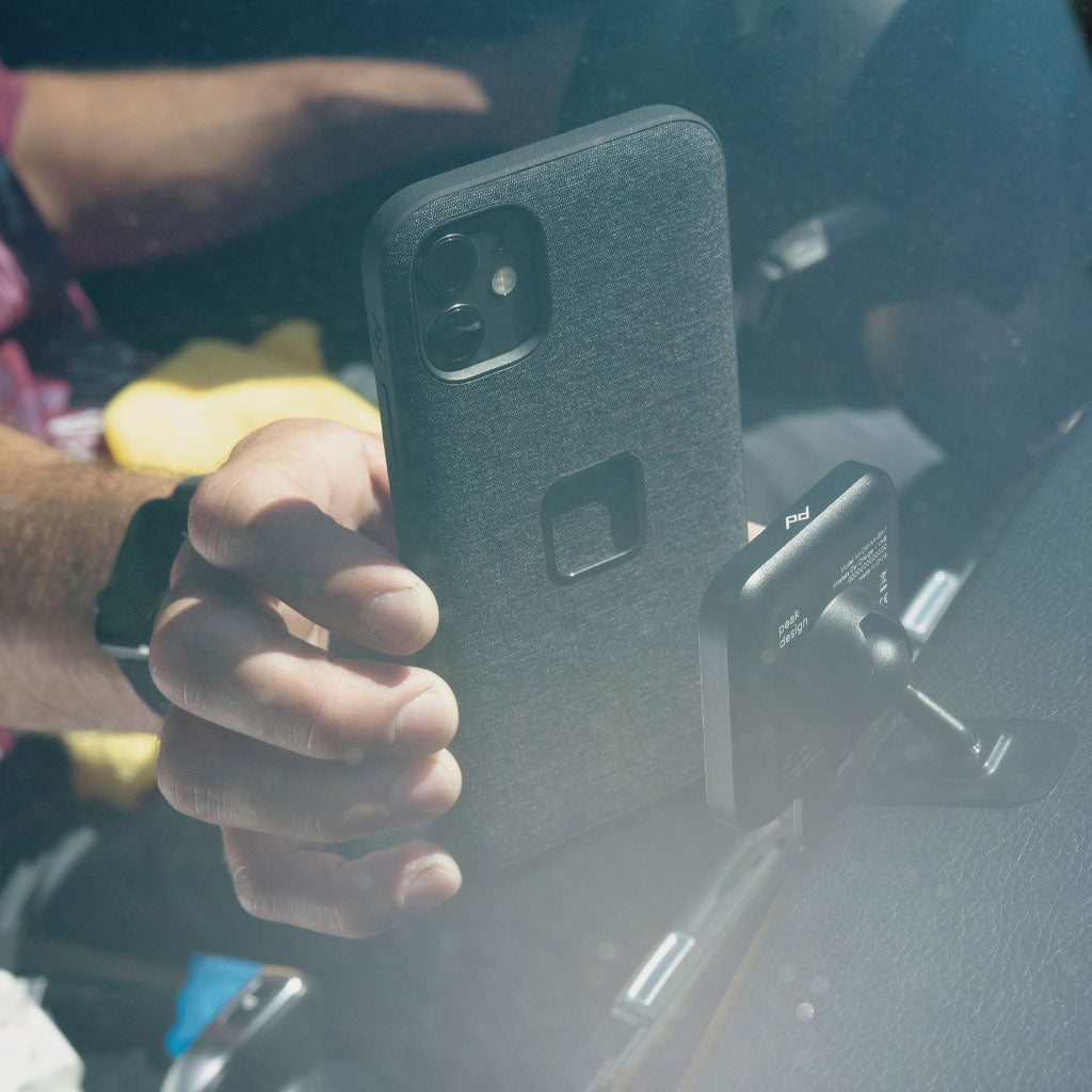 (image), John holding his iphone with Everyday case and about to attach it on a charging car mount, M-CM-AA-BK-1, M-CM-AA-BK-2, black