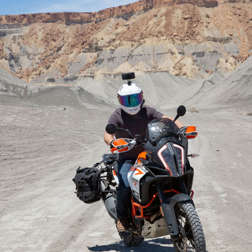 (image), Michael riding his moving motorcycle with his phone attached on his helmet using Creator Kit,  M-CK-AA-BK-1