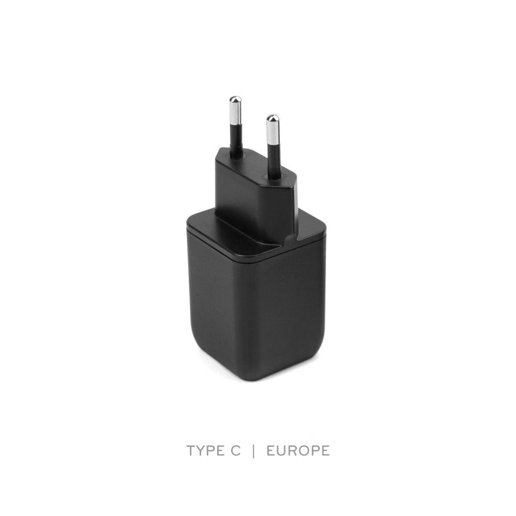 (image), Top view of a Type C USB C black wall power adapter, M-WPA-EU-1 