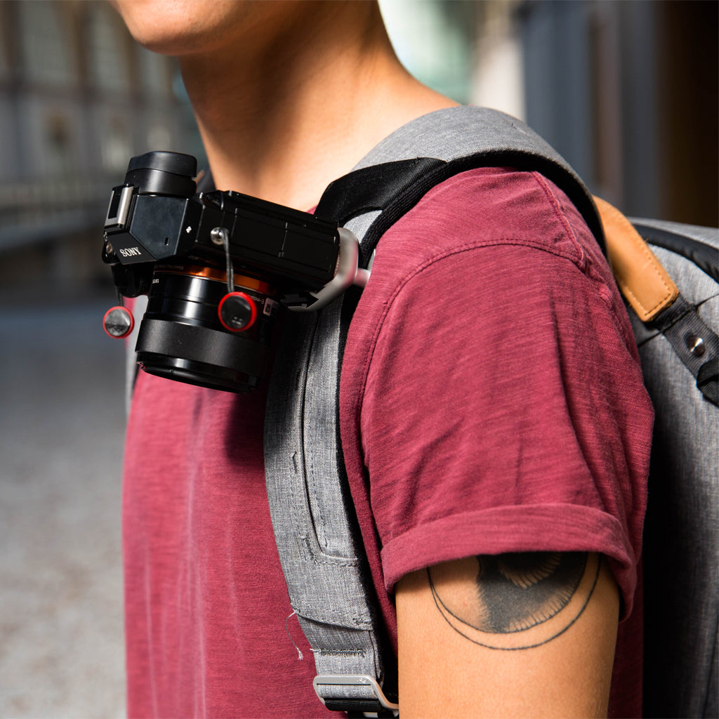 (image), Alvin using his Silver Capture on his Everyday Backpack with a camera clipped on it, CP-S-3,  silver