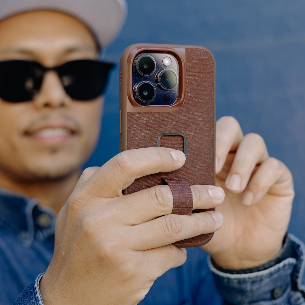 (image), John holding his iPhone 15 Pro Max using its Redwood Everyday Case finger loop, M-LC-BL-CH-2, M-LC-BL-MN-2, M-LC-BL-SG-2, M-LC-BL-SN-2, M-LC-BL-RD-2