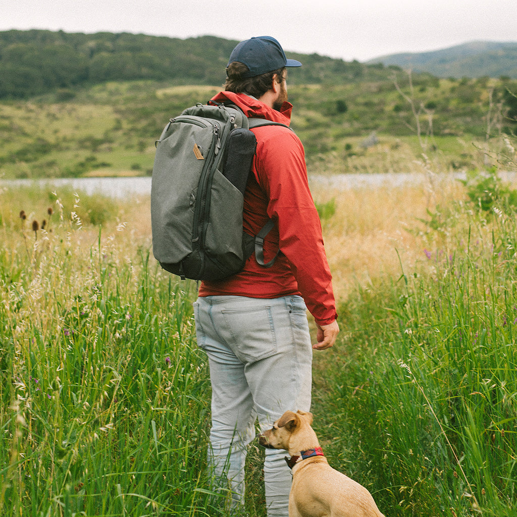 (image), Lawrence with his tripod on the 45L travel backpack side pocket, TT-TB-5-150-1