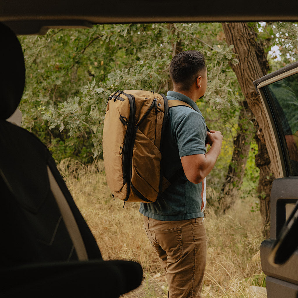 (image), Rob wearing his 45L Coyote Travel Backpack, BTR-45-CY-2, coyote