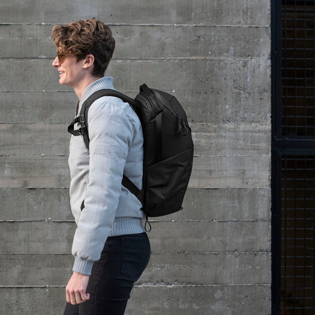 Adrienne strolling with her Black Backpack Zip