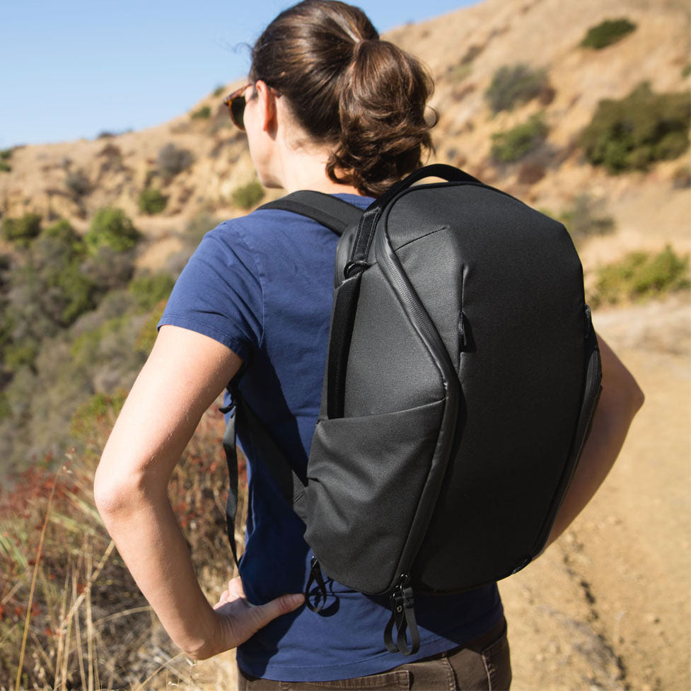 Anne hiking wearing her Black Backpack Zip