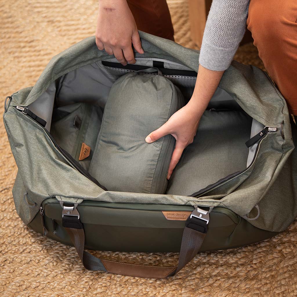 (image), Small Sage Packing Cube inside the duffel bag, BPC-S-SG-1