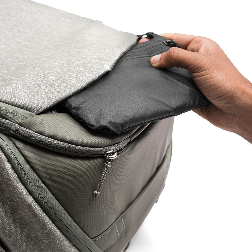 (image), Keeping the rain fly on the external magnetic pocket at the bottom of 45L travel backpack, BTR-RF-45-BK-1