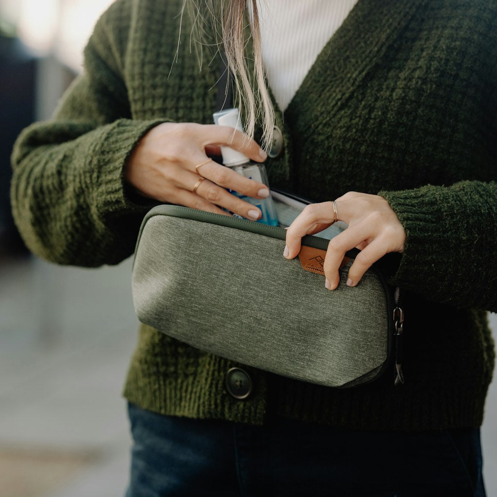 (image), putting item inside a sage small tech pouch , BTP-S-SG-1