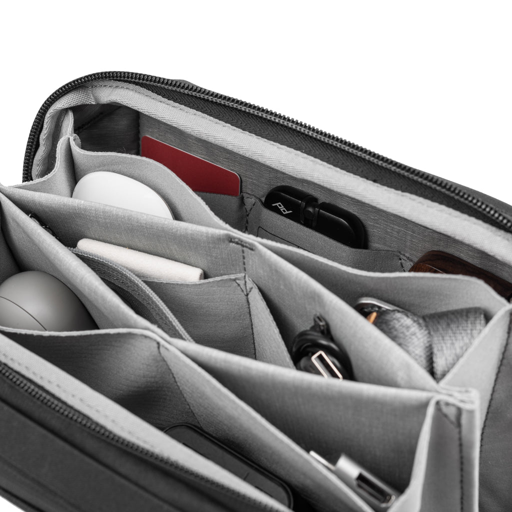 no-show, mobile tripod and more inside the black tech pouch