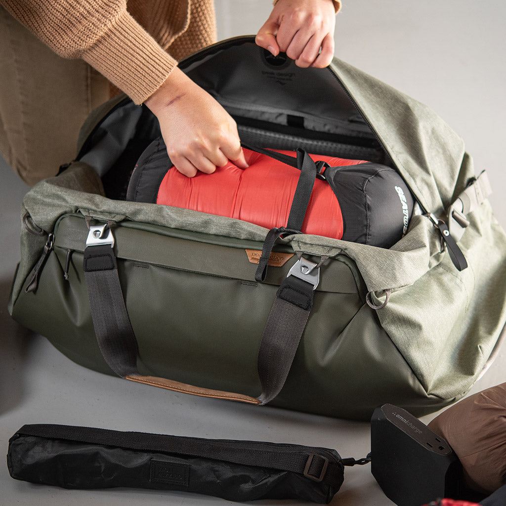 (image), inside of the 65L sage duffel bag using its hand strap, BTRD-65-SG-1