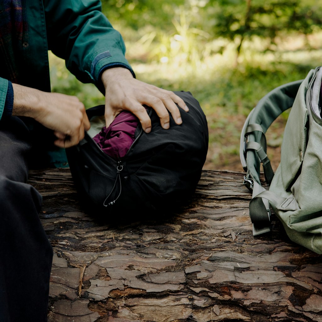 (image), Actual usage sideview of black ultralight packing cube, BUP-BK-XXS-1, BUP-SG-BK-1, BUP-BK-S-1