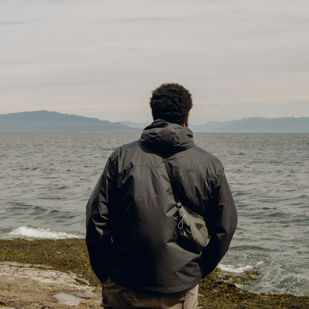 (image), back of James wearing ultralight packing cube by the ocean, BUP-SG-XXS-1, BUP-SG-XS-1, BUP-SG-S-1