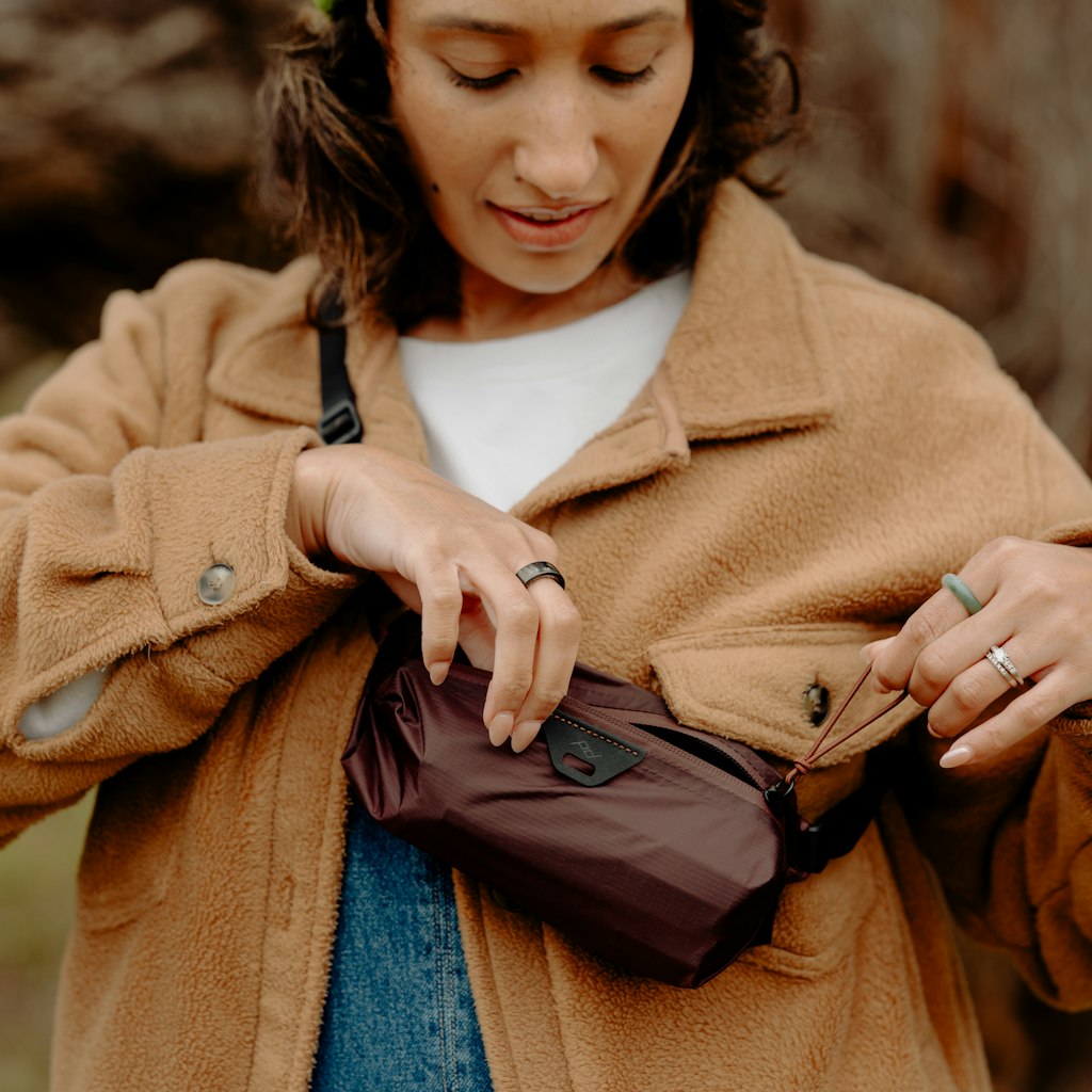 (image), A girl using eclipse variant of ultralight packing cube, BUP-EP-XXS-1, BUP-EP-XS-1, BUP-EP-S-1