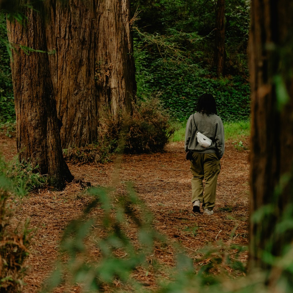 (image), Farther back view of a guy using the cloud variant of ultralight packing cube, BUP-CD-XXS-1, BUP-CD-XS-1, BUP-CD-S-1